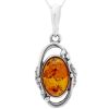 Vintage Look Oval Silver Pendant with Amber